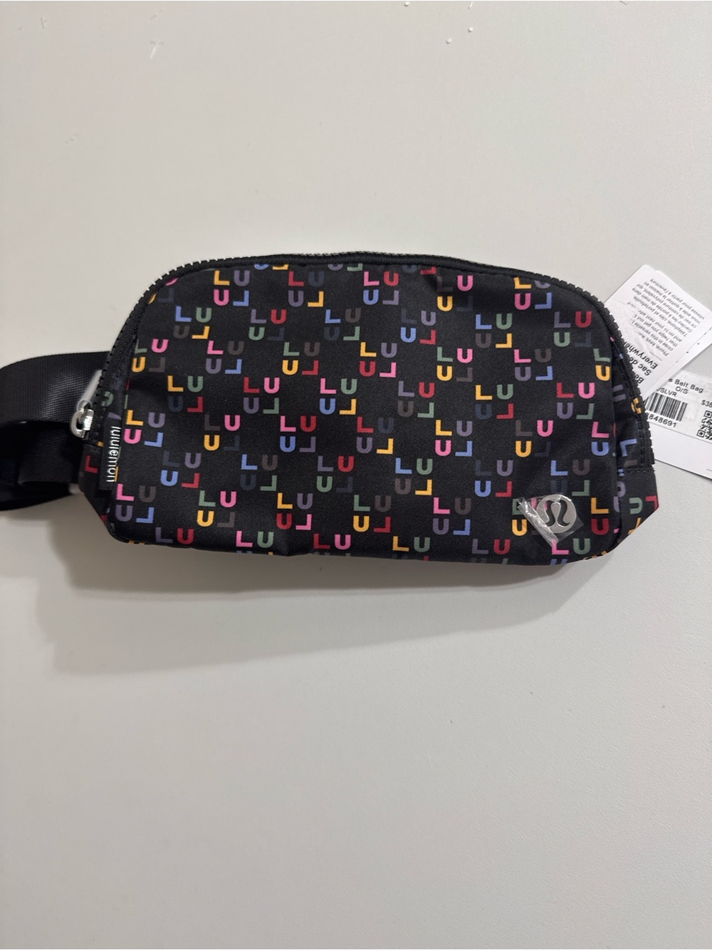 lululemon athletica Black Crossbody Belt Bag with Multicolor 'LU' Print